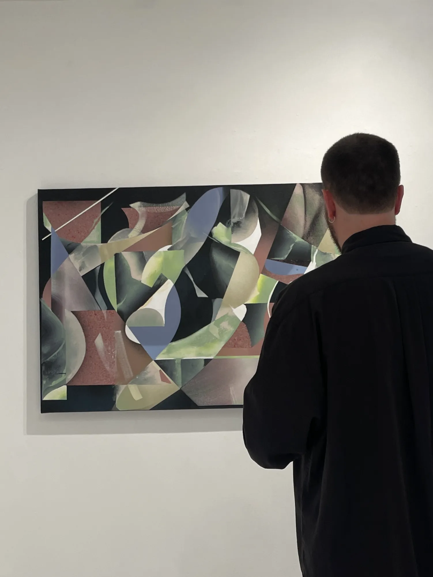 Visitor viewing Moonee Night by URSHTRAY at Mirus Gallery, San Francisco