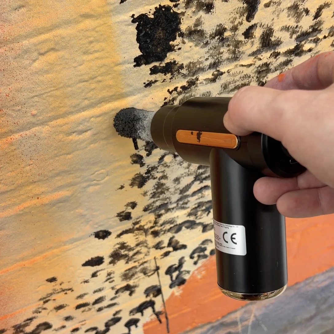 Abstract orange and black mural by URSHTRAY on a heritage building, Rathdown Street, Melbourne